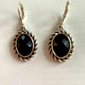 Black facet cut oval earrings in silver. NWOT